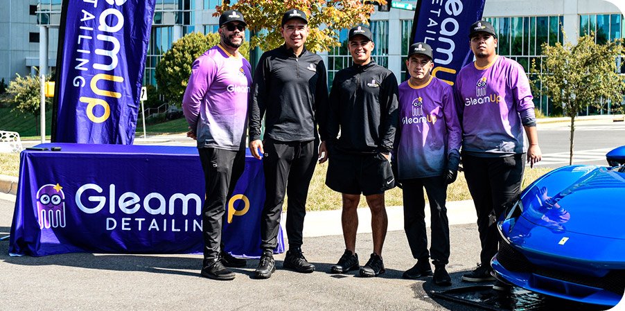 Team from GleamUp Detailing, a mobile detailing company, providing on-site services